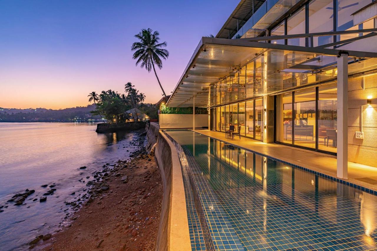 Oceanic Sunsets With River View, Comp Breakfast & Infinity Pool At Stayvista Verem Exterior foto
