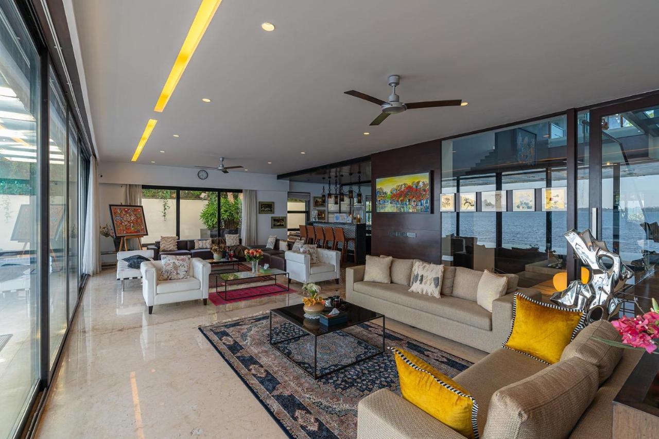 Oceanic Sunsets With River View, Comp Breakfast & Infinity Pool At Stayvista Verem Exterior foto